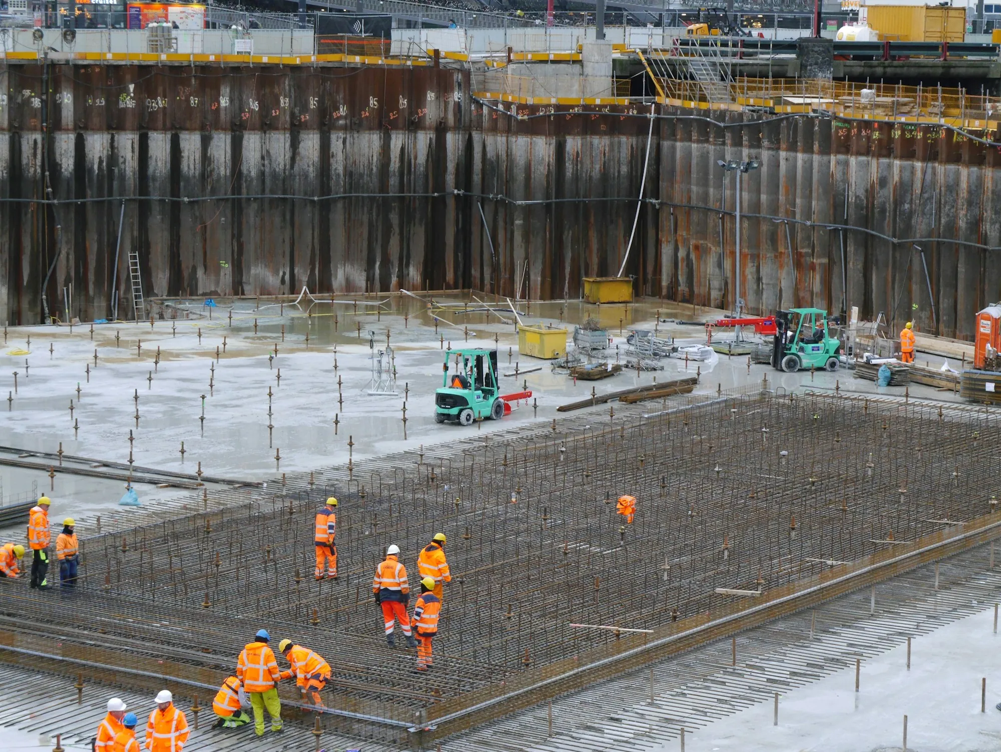 Large foundation slab with rebar and crew at work